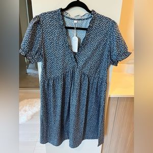 Navy ditsy floral baby doll dress. Size Large. Never worn.
